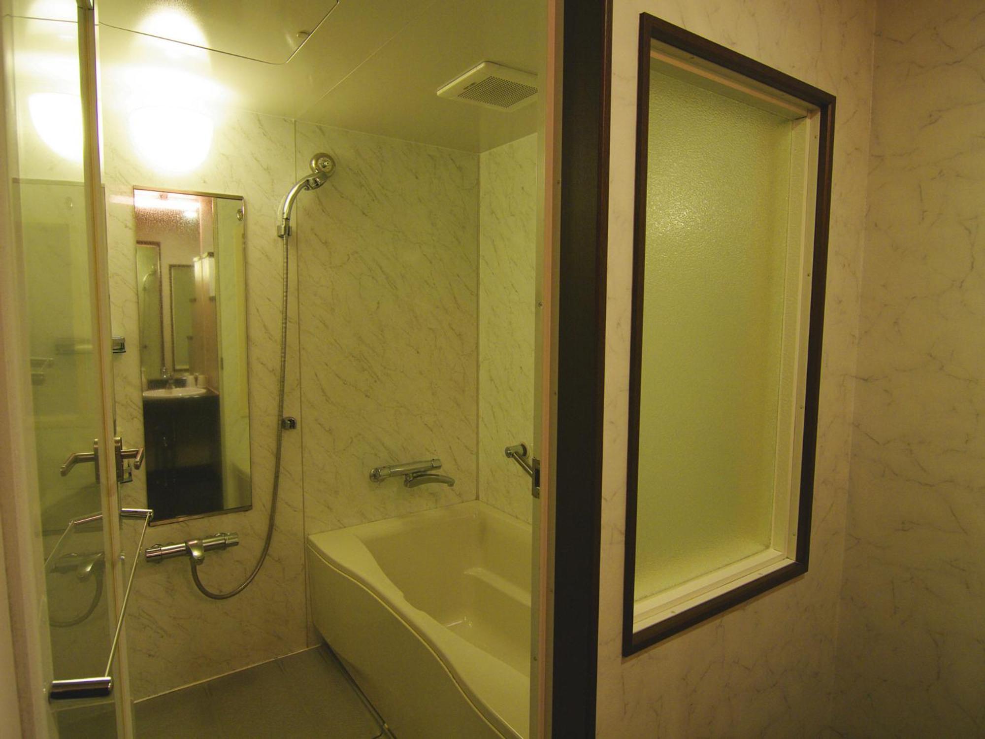 Tsukubanoyu Urban Hotel Værelse billede