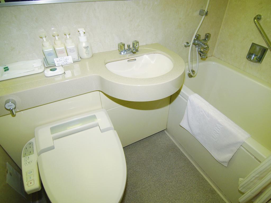 Tsukubanoyu Urban Hotel Værelse billede